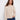 Heather oat sweater featuring a cozy mock neck and wide cuffs, perfect for relaxed styling by Charlie B.