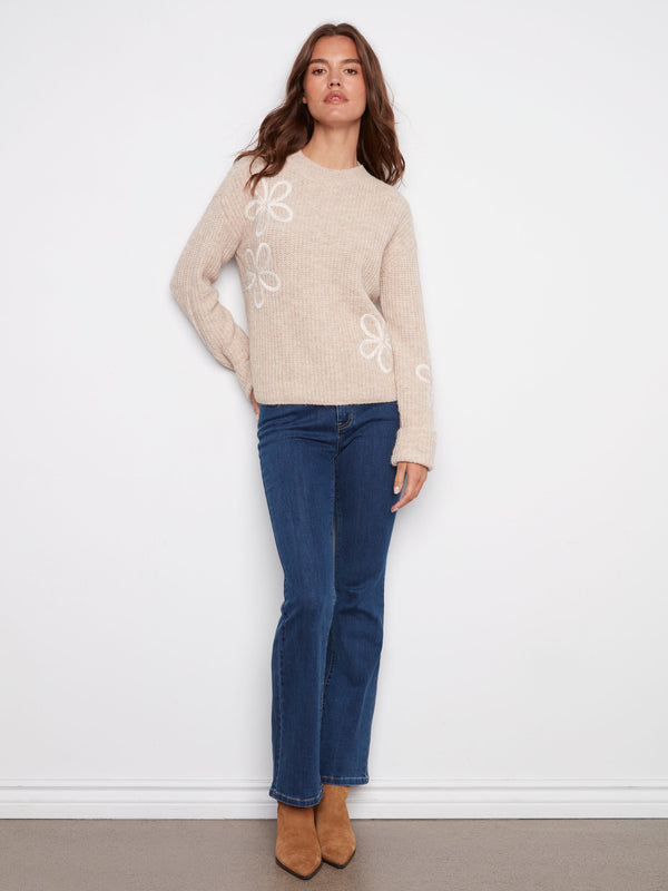 Enjoy the relaxed fit of this heather oat sweater, combining comfort with style by Charlie B.