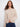 Heather oat sweater with intricate floral soutache details for an elegant look by Charlie B.
