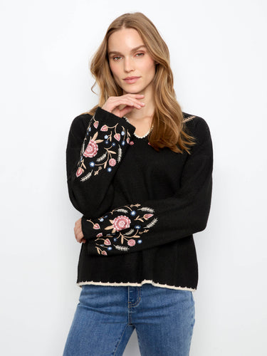 Sweater featuring long wide sleeves with intricate embroidered floral details by Charlie B.