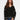 Black sweater featuring a drop shoulder design and white embroidery accents for a stylish look by Charlie B.