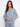 Heather denim sweater featuring drop shoulders and a relaxed fit for casual elegance by Charlie B.
