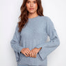 Heather denim sweater featuring drop shoulders and a relaxed fit for casual elegance by Charlie B.