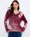 Cotton blend V-neck sweater with drop shoulders and floral accents, perfect for a cozy day by Charlie B.