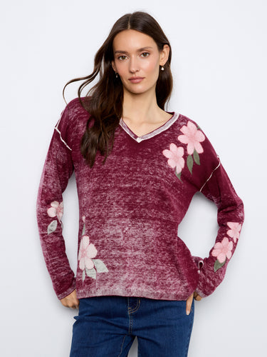 Cotton blend V-neck sweater with drop shoulders and floral accents, perfect for a cozy day by Charlie B.
