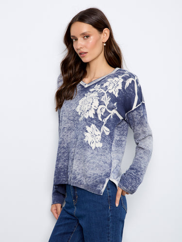 Versatile and stylish, this V-neck sweater features drop shoulders for added sophistication in any outfit. By Charlie B.