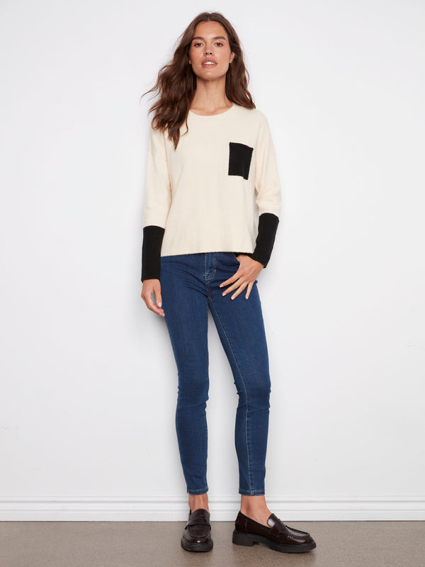 Long-sleeved ecru sweater with chic contrast ribbed cuffs, offering both comfort and style by Charlie B.