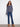 Featuring a unique drop shoulder design, this blue multi-tone crochet sweater is crafted with care by Charlie B.