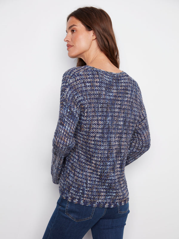 Crafted from crochet novelty yarn, this blue multi-tone sweater offers comfort and style in one piece by Charlie B.