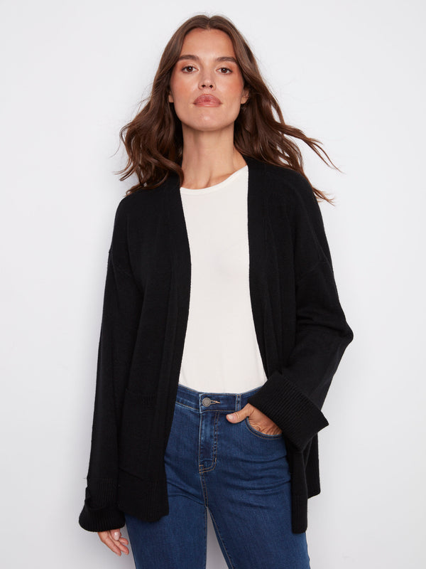 Black cardigan featuring wide cuffs and a relaxed fit, perfect for layering with any outfit by Charlie B.