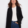 Black cardigan featuring wide cuffs and a relaxed fit, perfect for layering with any outfit by Charlie B.