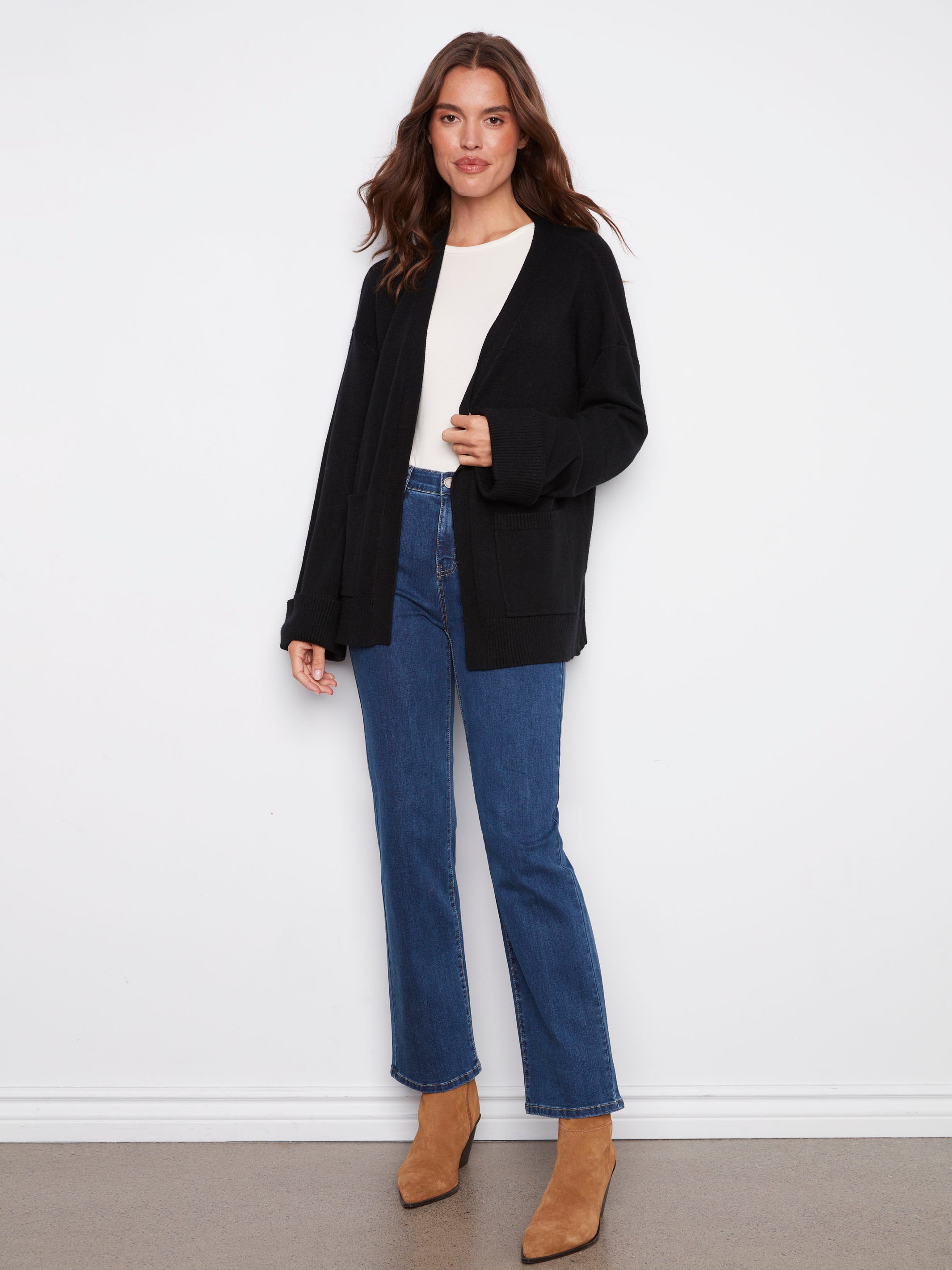 Stylish black cardigan with patch pockets, offering both functionality and elegance by Charlie B.