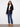Stylish black cardigan with patch pockets, offering both functionality and elegance by Charlie B.