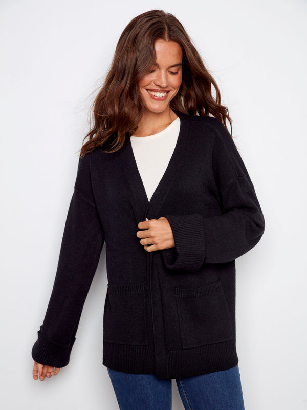 Chic black cardigan showcasing an open front design, adding a modern touch to your wardrobe by Charlie B.