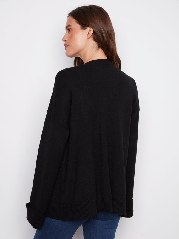 Versatile black cardigan with patch pockets, ideal for carrying small essentials effortlessly by Charlie B.
