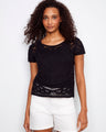 This black crochet top features a stylish button-down front, offering a chic look for any occasion by Charlie B.