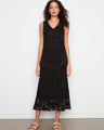 Elegant black crochet maxi dress featuring a lined design for added comfort and style by Charlie B.