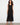 Elegant black crochet maxi dress featuring a lined design for added comfort and style by Charlie B.