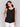 Black linen tank top with a high-low hemline by Charlie B.