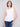 Distinctive side button detailing on a white tank top by Charlie B.