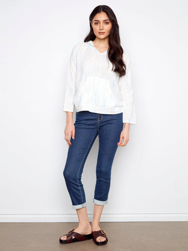 This versatile piece combines comfort and style with its unique details, making it a wardrobe staple. Created by Charlie B.