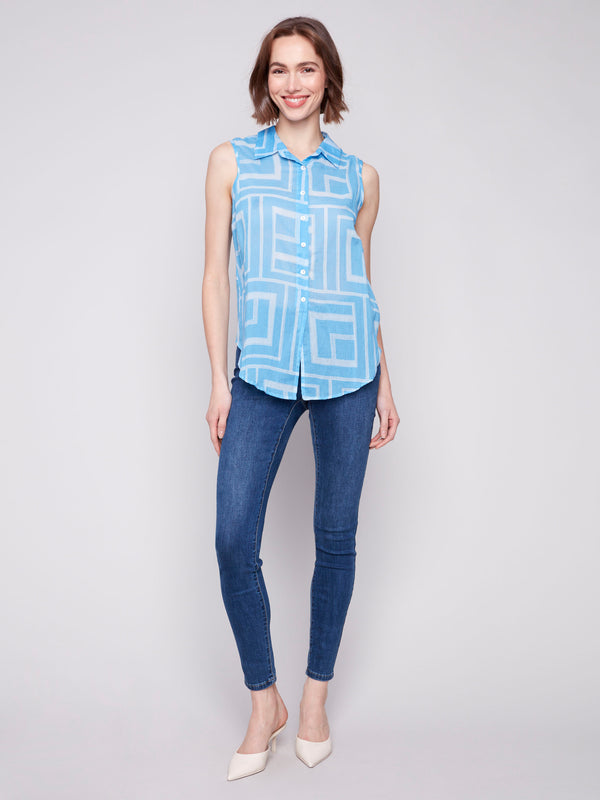 Fashionable sleeveless design in bluebell with a front tie knot by Charlie B.