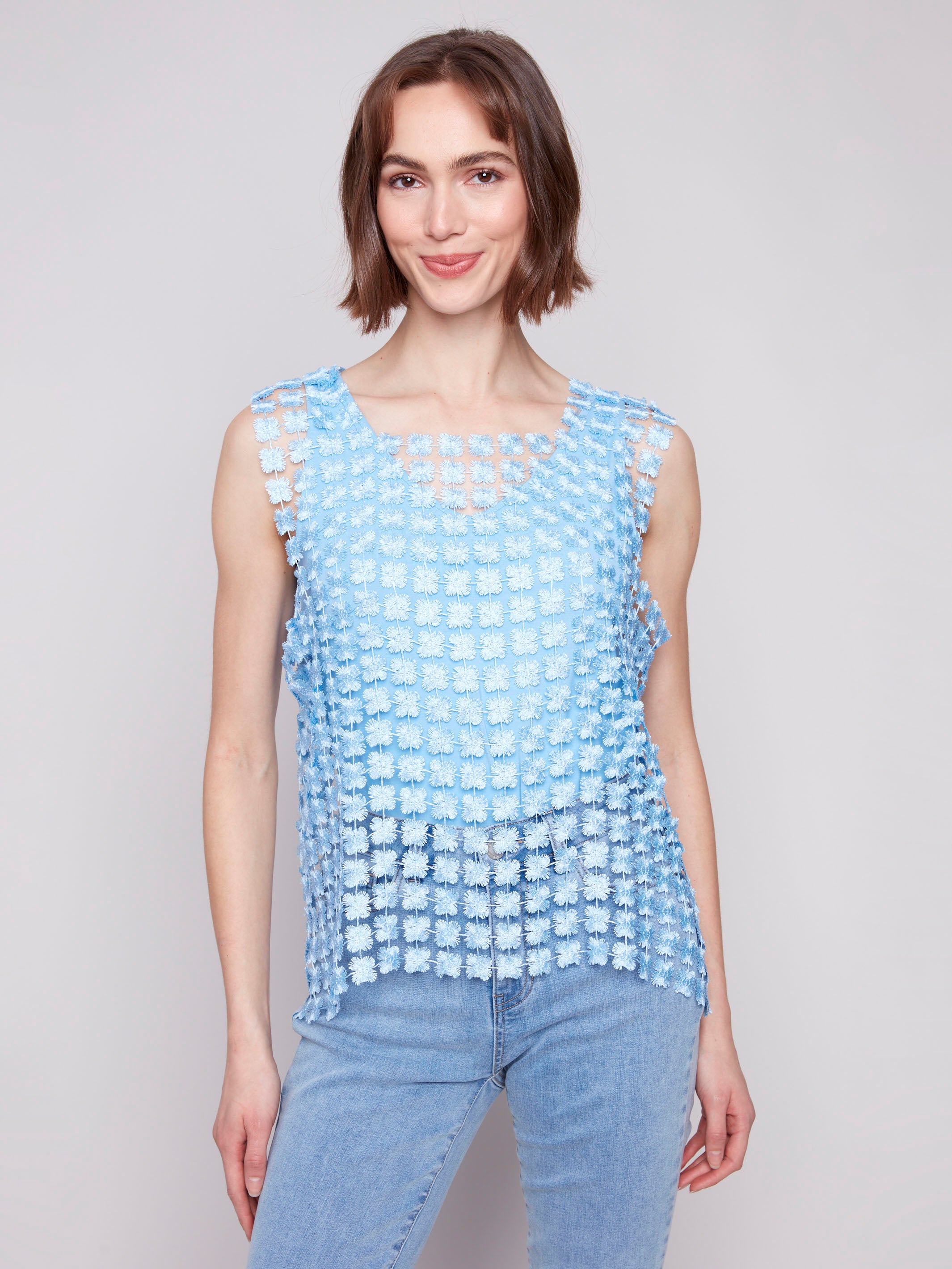 This bluebell top runs large, offering a relaxed fit for casual outings by Charlie B.