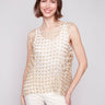 Gold crochet top with a square neckline, perfect for a chic look by Charlie B.