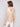 Square neckline enhances the modern appeal of this gold top by Charlie B.