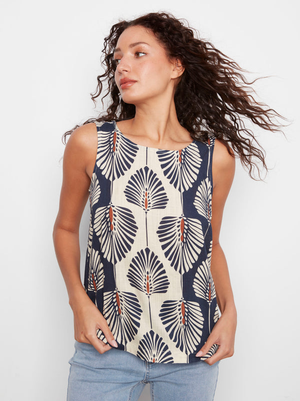 Tahiti-inspired abstract print on this linen blend blouse, complete with sleeveless design for summer style by Charlie B.