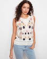 The top features a classic crew neckline, adding elegance to any outfit. Designed by Charlie B.