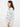 The delicate crochet design enhances the elegance of this piece. Crafted from premium cotton blend for comfort by Charlie B.