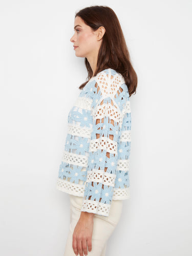 The delicate crochet design enhances the elegance of this piece. Crafted from premium cotton blend for comfort by Charlie B.