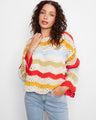 Colorful crochet top with drop shoulders and scalloped hem, adding a playful touch to your wardrobe by Charlie B.
