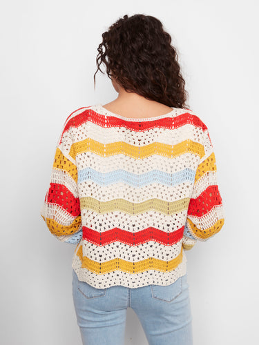 Chic crochet top showcasing a boat neckline and eye-catching design, ideal for fashion-forward individuals by Charlie B.