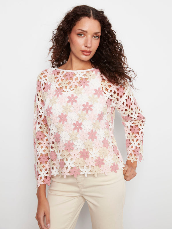 White crochet top with pink floral pattern and boat neckline by Charlie B.