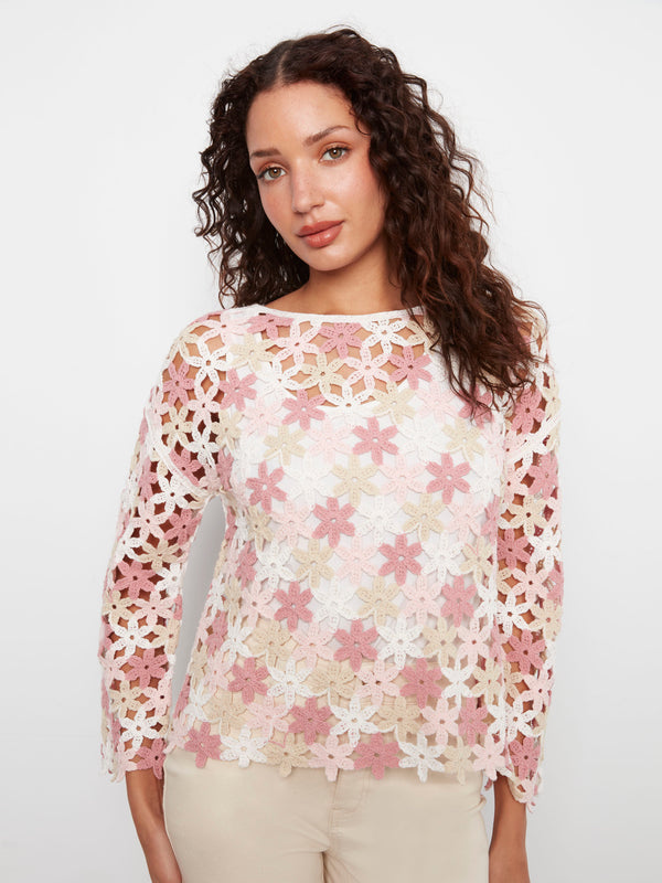 Pink floral crochet top featuring a stylish boat neckline by Charlie B.