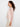 Natural white crochet top with 3/4 sleeves and floral accents by Charlie B.