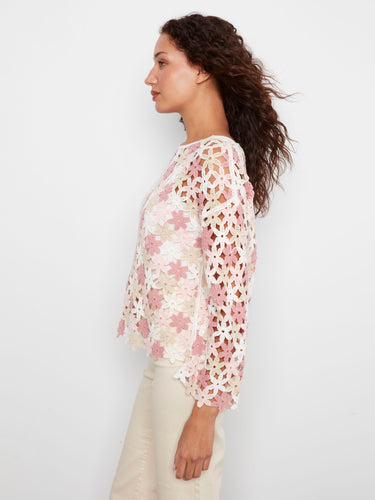 Natural white crochet top with 3/4 sleeves and floral accents by Charlie B.