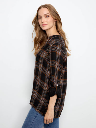 Featuring adjustable roll-up sleeves, this plaid shirt offers both style and practicality for any occasion by Charlie B.
