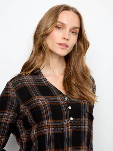 Enjoy the comfortable fit of this plaid shirt with its Henley neckline and modern design elements by Charlie B.