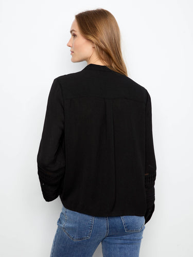 Sophisticated blouse showcasing knife-pleat accents, adding a touch of flair to your wardrobe by Charlie B.