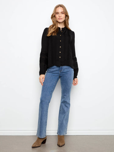 Classic black blouse with button-front closure and long sleeves, crafted in luxurious crepe fabric by Charlie B.