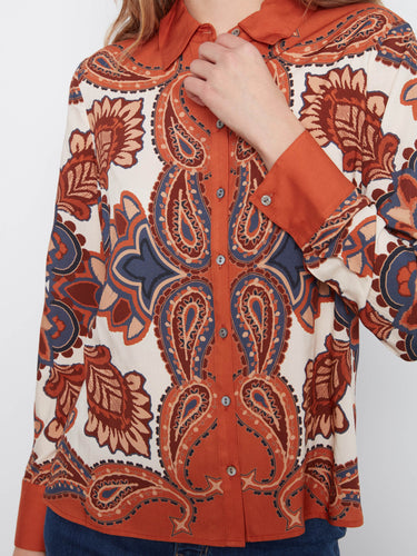 Sophisticated button front closure on this paisley print blouse offers both style and comfort for everyday wear by Charlie B.