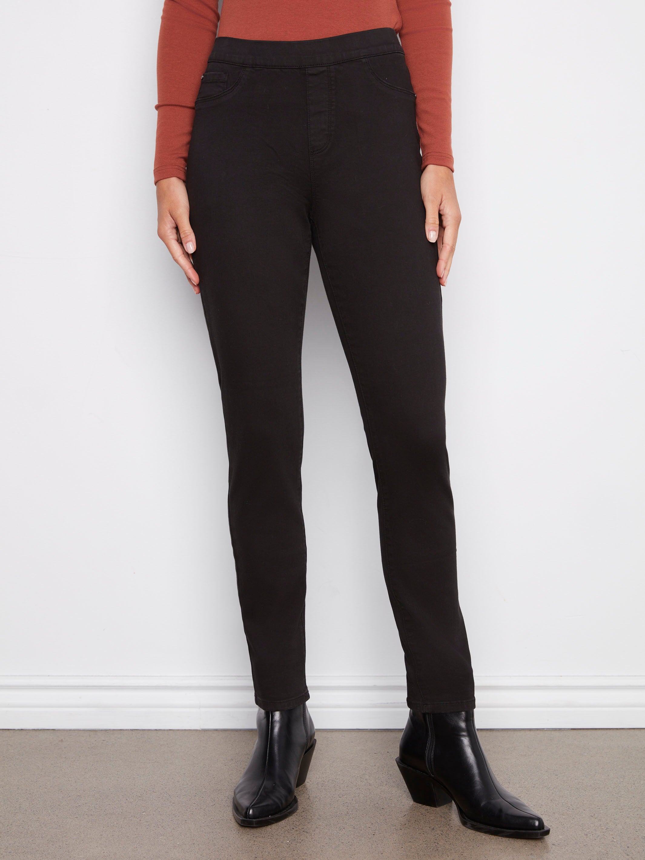 Featuring a pull-on waistband, these black twill pants provide sleek style and easy wear by Charlie B.