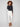 Natural-colored pants in a slim fit, featuring stretch denim fabric and stylish frayed hem by Charlie B.