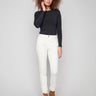 Natural-colored pants in a slim fit, featuring stretch denim fabric and stylish frayed hem by Charlie B.