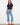 Stylish denim pants with a bootcut fit and fringed hem detail, offering a chic twist on classic jeans by Charlie B.