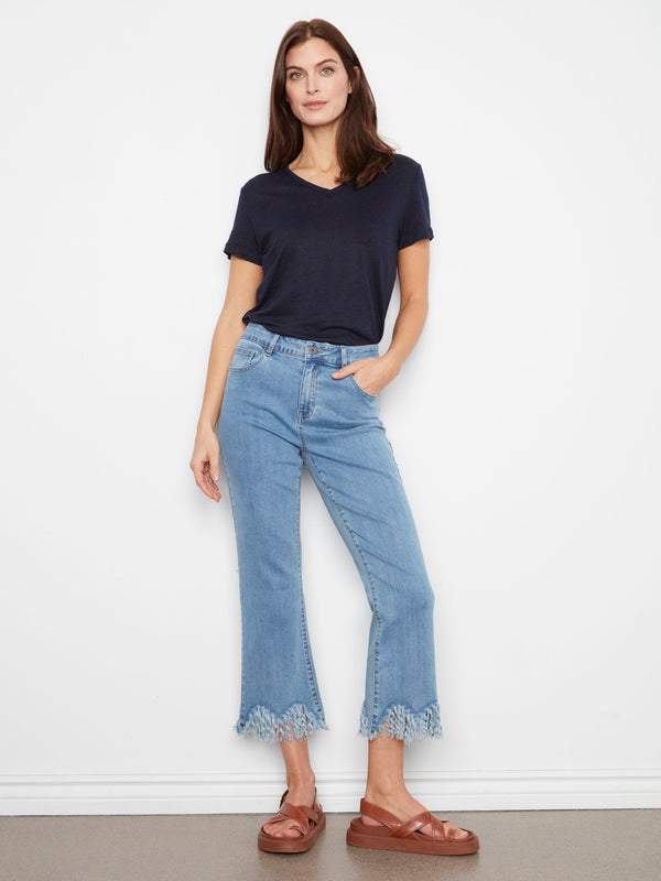 Stylish denim pants with a bootcut fit and fringed hem detail, offering a chic twist on classic jeans by Charlie B.