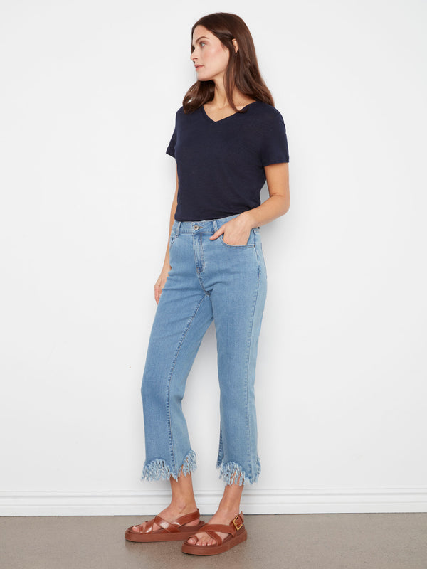 Fringed hem detail adds flair to these stretch denim jeans, combining comfort and style effortlessly by Charlie B.